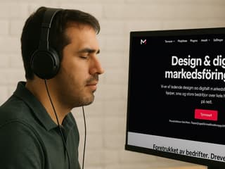 Person with visual impairment using a screen reader and headphones to navigate a website